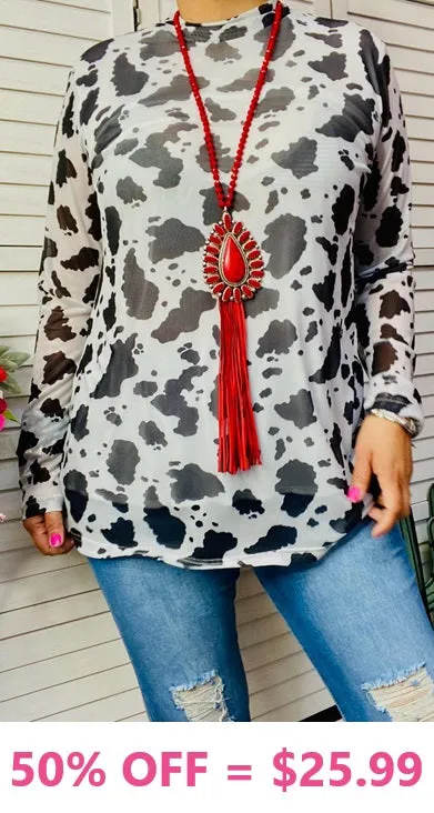 Black and White cow print top with sheer long sleeves